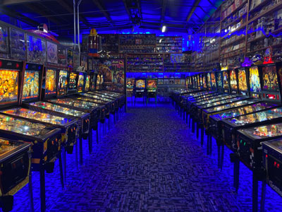 interior of Next Level Pinball showing an aisle of game machines